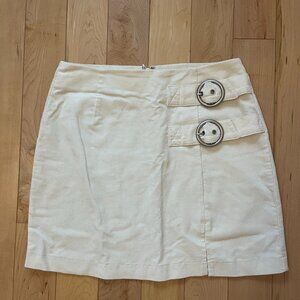 cream side buckles mini skirt